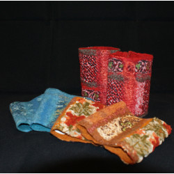 Nunotovade handledsvärmare i olika färger