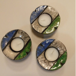 Ljuslykta i rakubränd keramik i de jämtländska färgerna