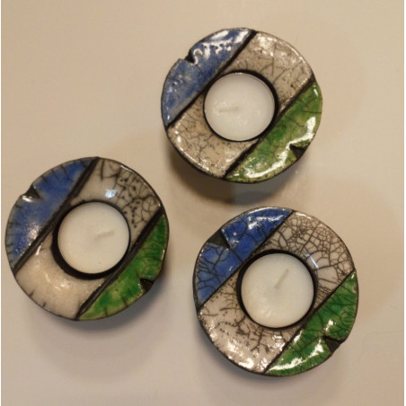 Ljuslykta i rakubränd keramik i de jämtländska färgerna