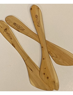 Smörkniv i ene med en glödritad brunkulla, Jämtlands landskapsblomma